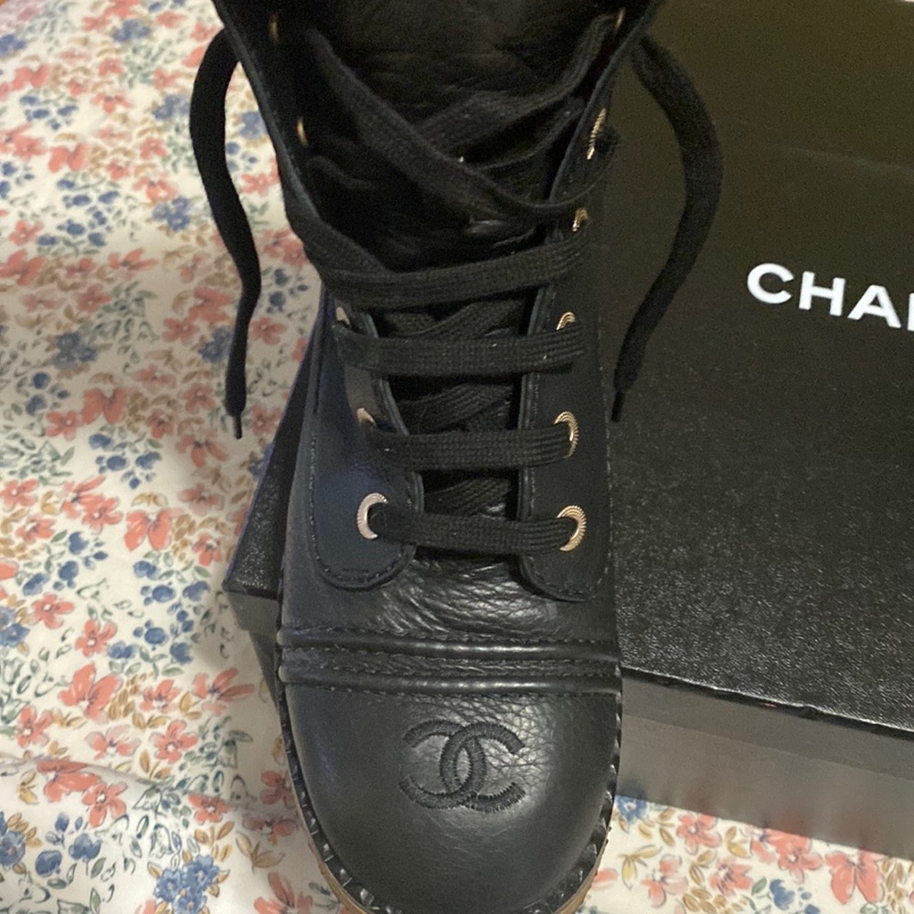 Chanel Lace up leather ankle short worn once. Calf skin rubber sole.